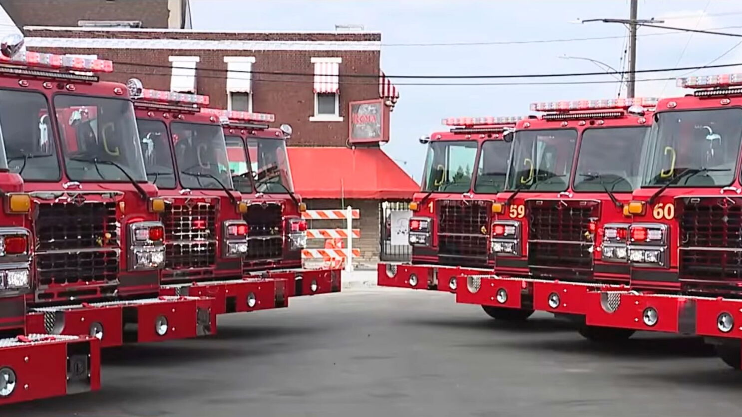 Fleet of fire engines at a fire station — Gas Protector locking fuel doors protect entire apparatus fleets